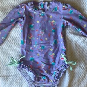 Ruffle Butts Purple Floral Baby Swimsuit